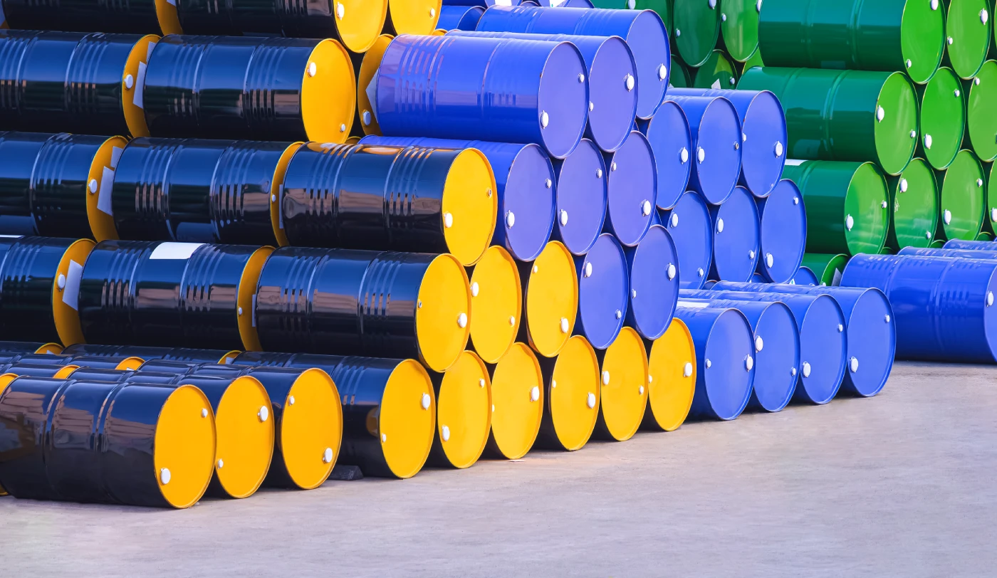 piles-of-many-various-200-litre-oil-drums-stacked